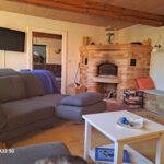 4_Wohnung1_Wohnzimmer mit Grundofen